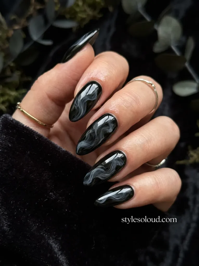 Glossy Black Nails with Subtle Smoke Effect Art