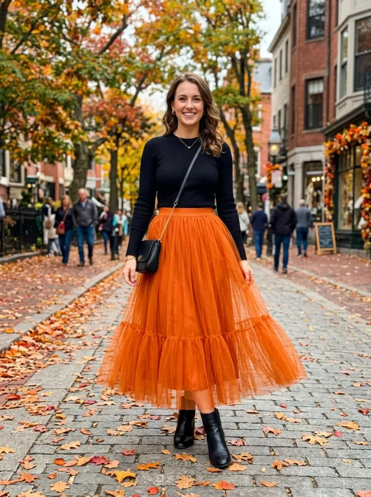 An Orange Tulle Skirt With a Fitted Black Knit