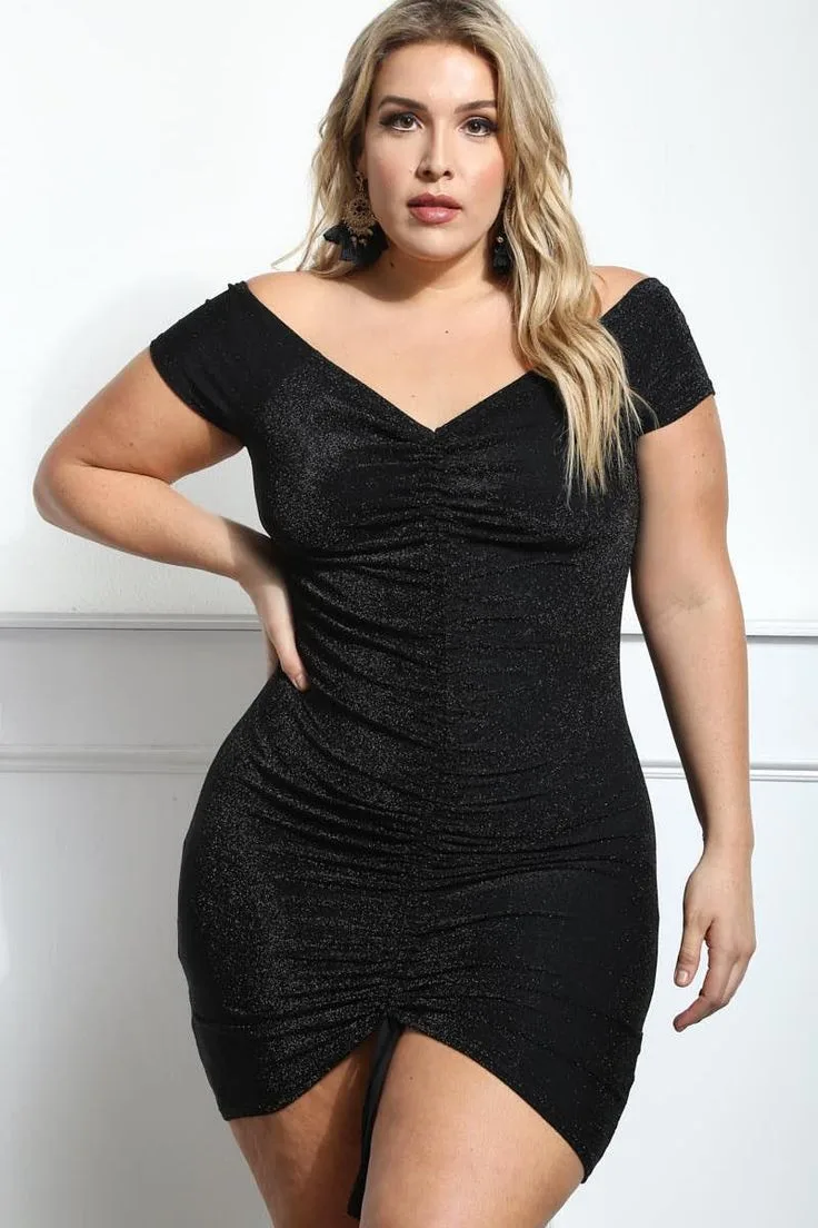 Plus size black dress outfit: off shoulder ruched mini dress