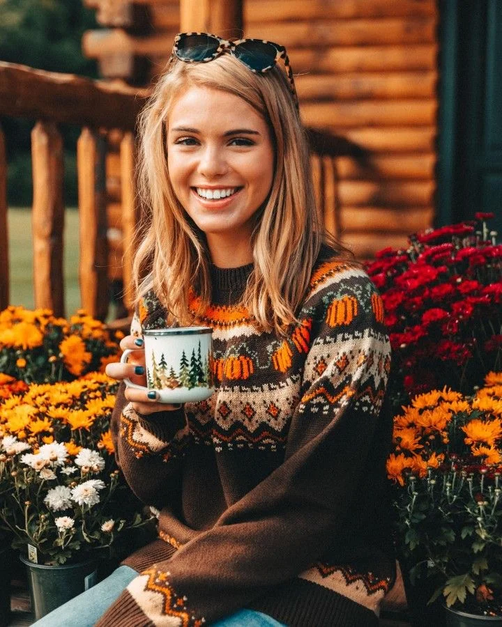 Thanksgiving sweater outfit: brown fair isle sweater with a warm mug