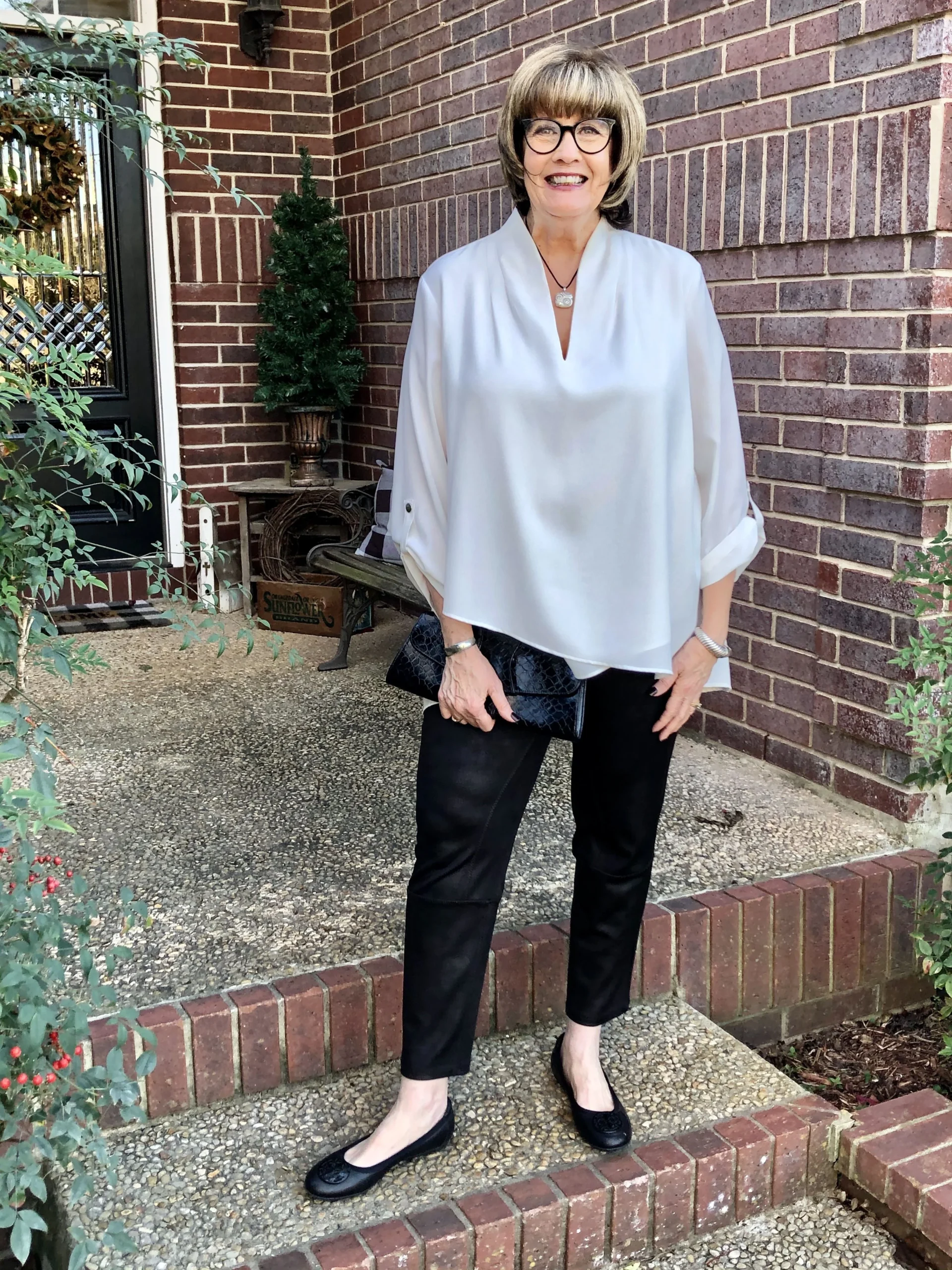 Light blue blouse with black pants dinner outfit