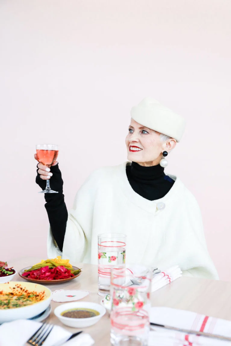 White cape with black top dinner outfit