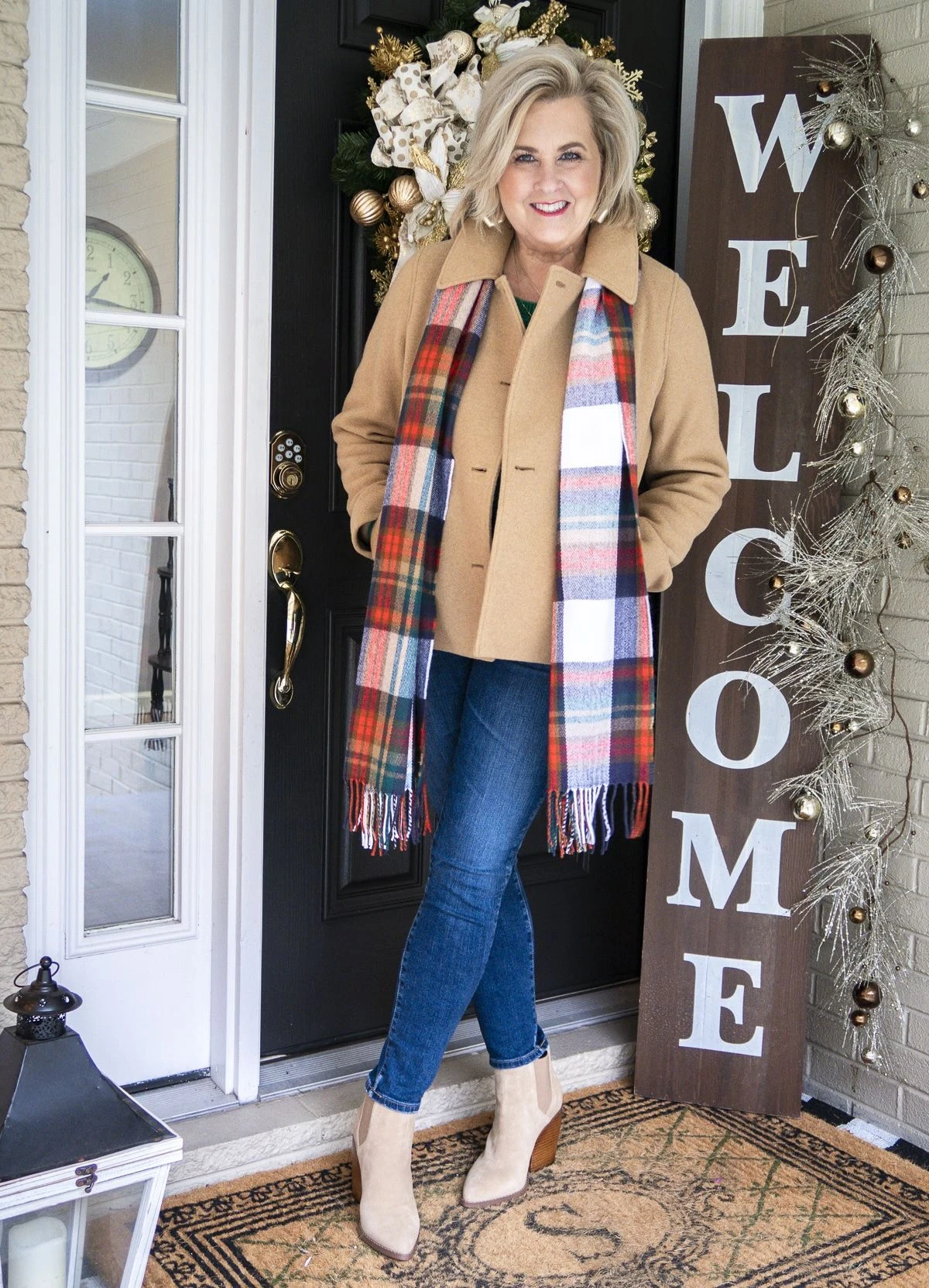 Camel Coat With a Plaid Scarf and Jeans - cozy fall outfit for women over 60