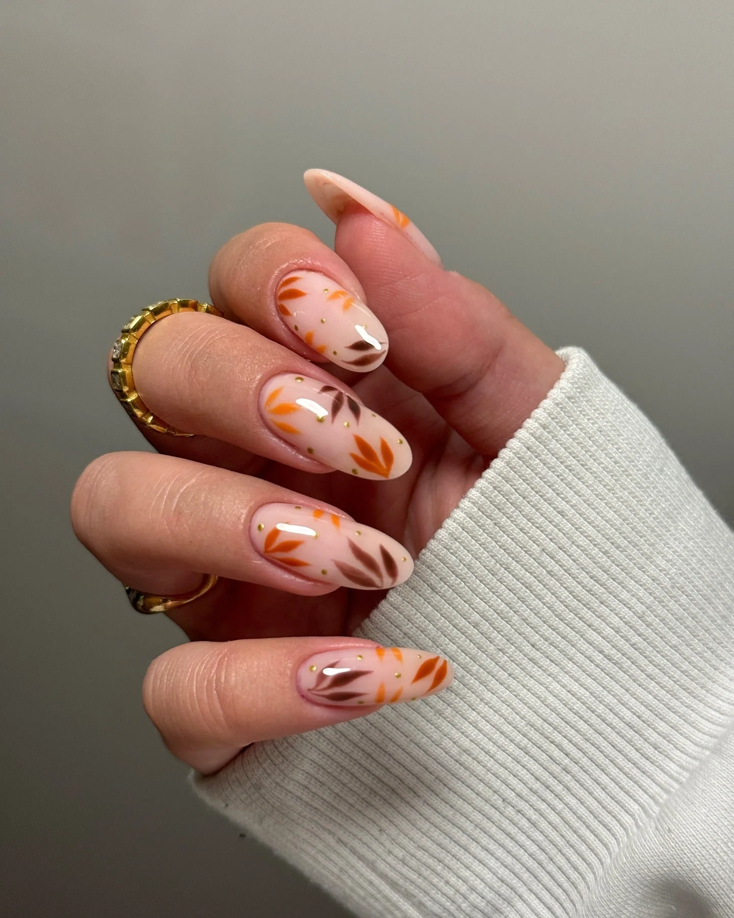 Easy fall nail ideas: amber almond nails with gold foil