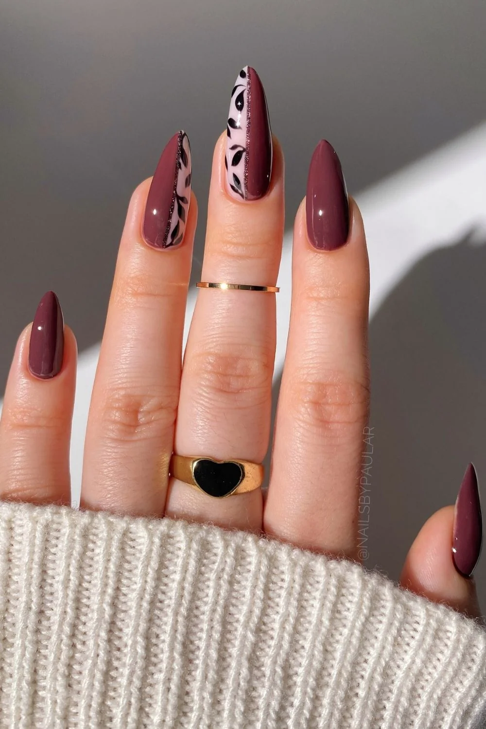 Easy fall nail ideas: burgundy nails with gold celestial art