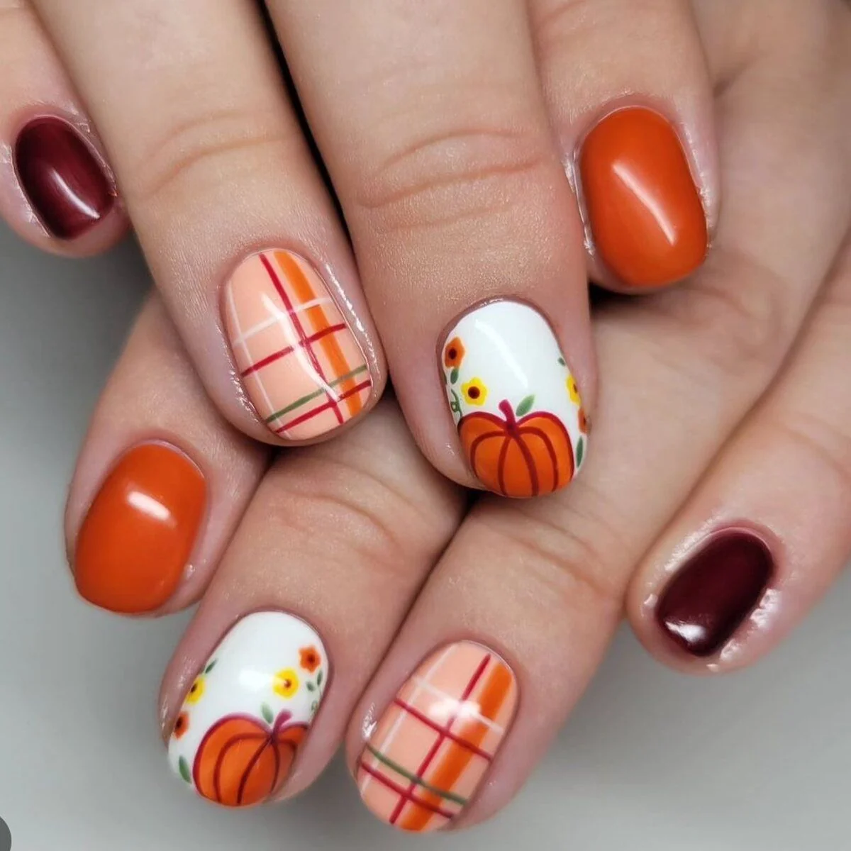 Easy fall nail ideas: pumpkin patch nail art with orange plaid