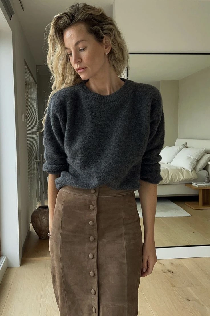 Grey knit sweater with a brown suede button front midi skirt