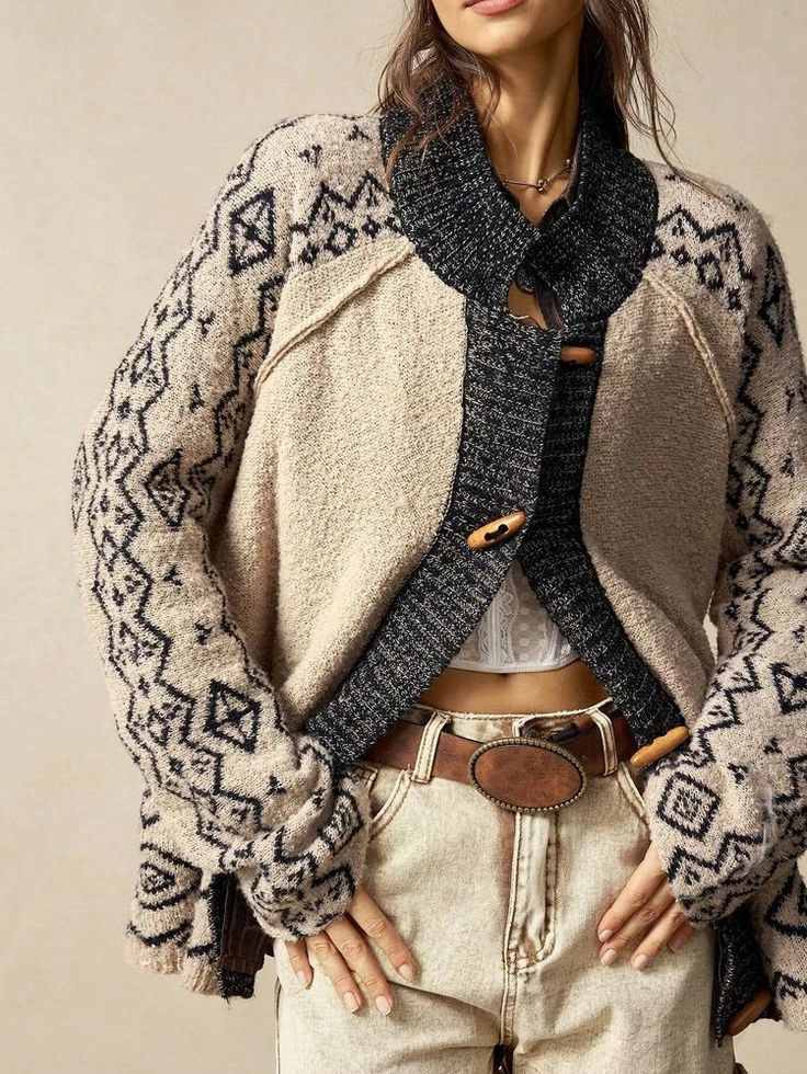 Patterned knit cardigan with cream jeans and a wide brown belt