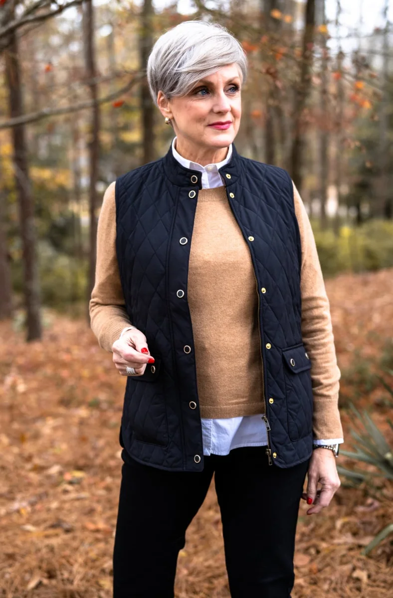 Mature woman in polka dot tunic and black leggings
