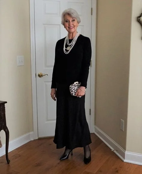 Elegant fall church outfit: black dress with layered pearls