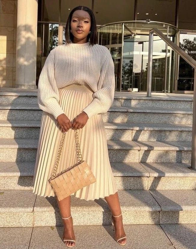 Modest fall church outfit: cream knit top with pleated midi skirt