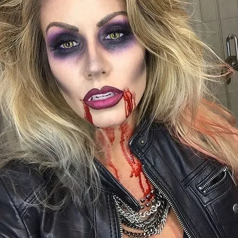 Leather jacket vampire makeup with smoky eyes and blood drips