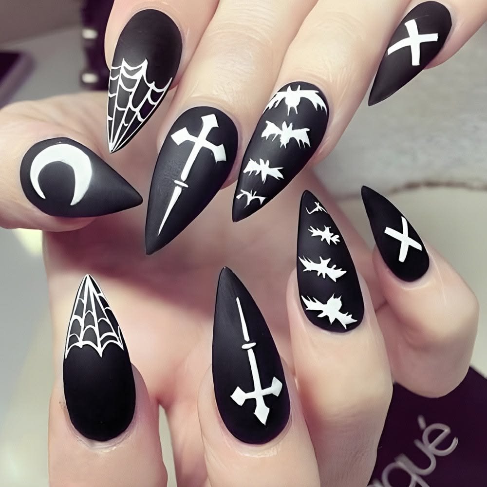 Halloween wedding nails: matte black with white crosses