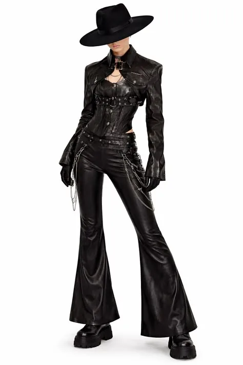 III points festival outfit: black leather jacket with flared leather pants and cowboy hat