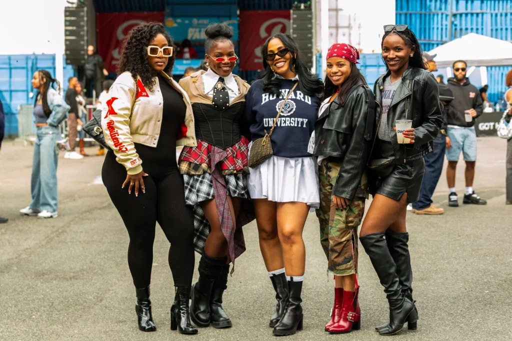 Group of Black women in Howard sweatshirts at a homecoming tailgate