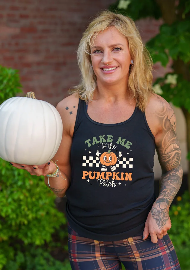 Pumpkin patch tank top: black graphic tank holding a white pumpkin