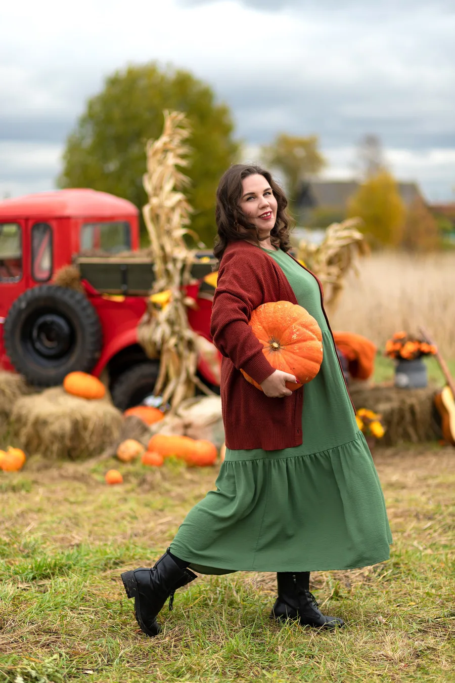 Pumpkin patch outfit: green midi dress with a rust cardigan