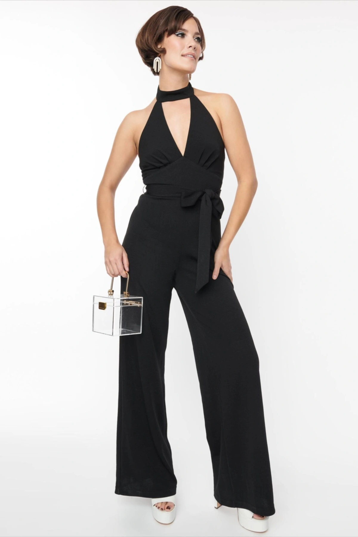 Black halter neck jumpsuit, sleek one piece fall date night outfit
