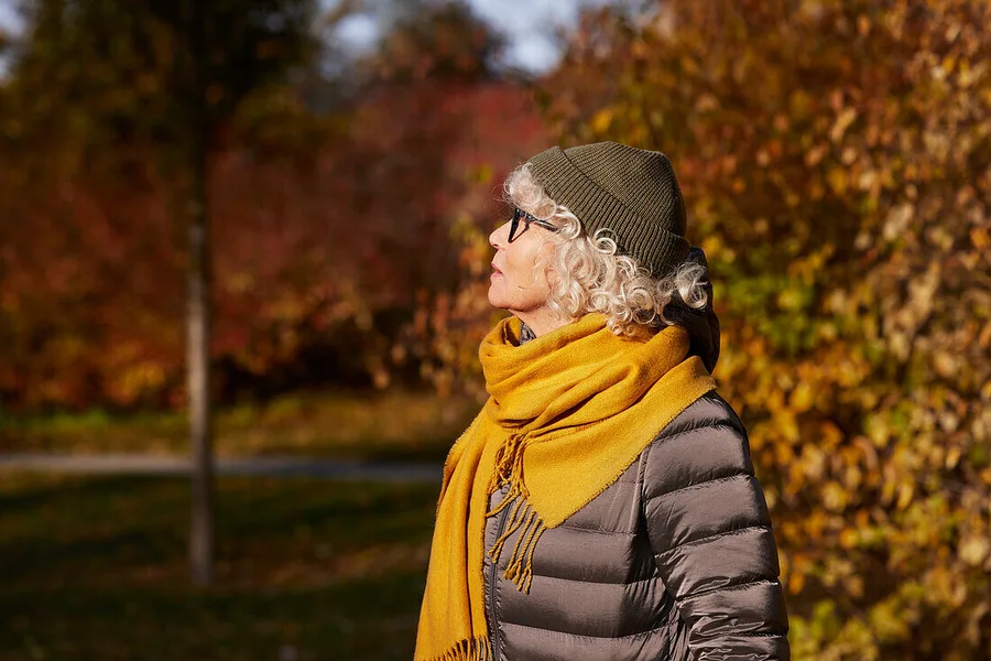 Pumpkin patch outfit: mustard yellow scarf with a quilted jacket