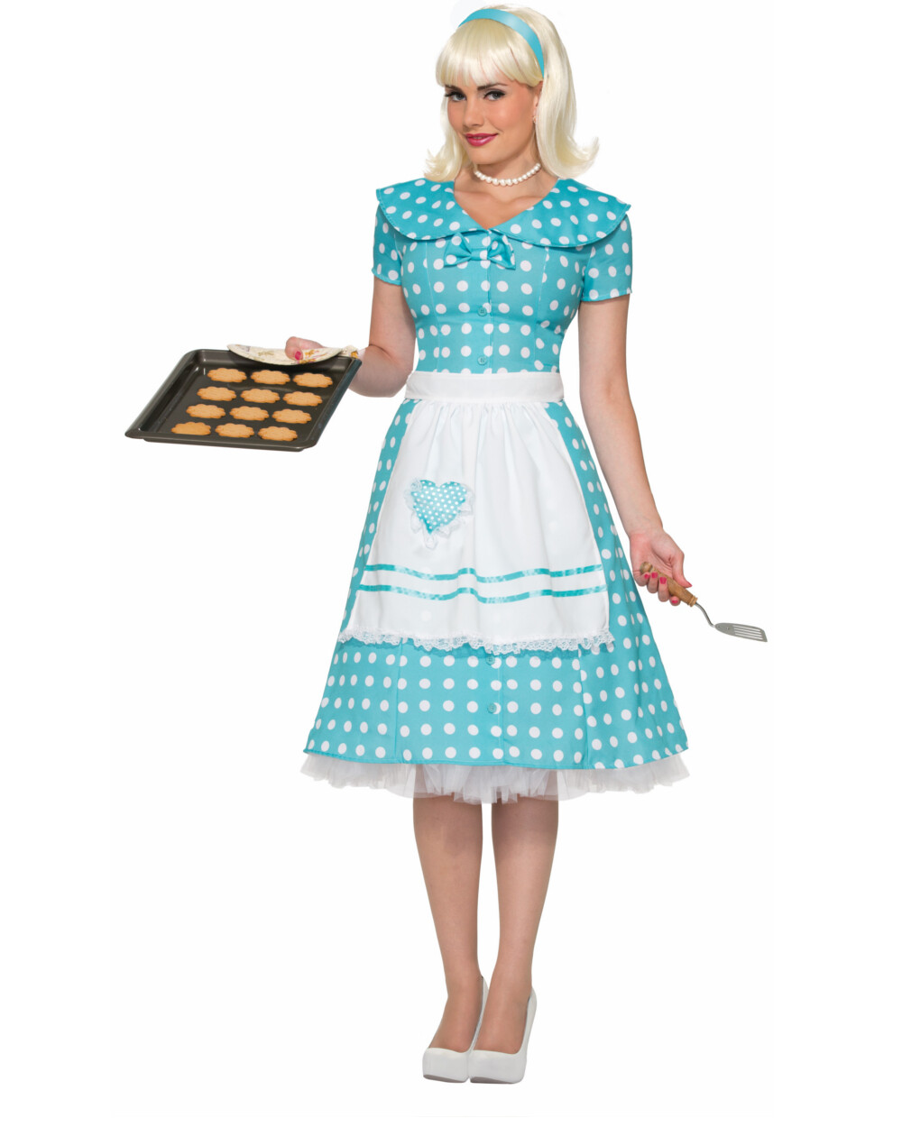 Woman in 1950s housewife costume with polka dot dress and apron