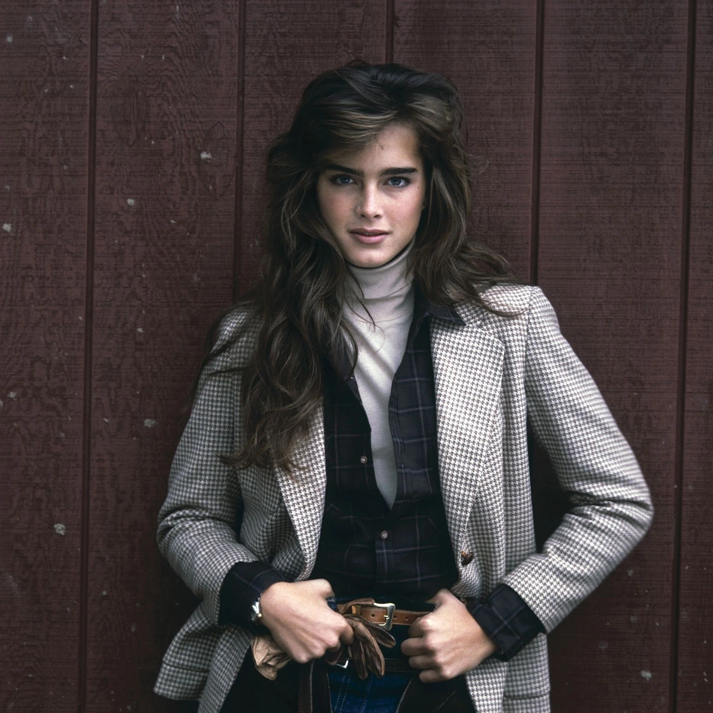 Woman in 80s preppy blazer outfit
