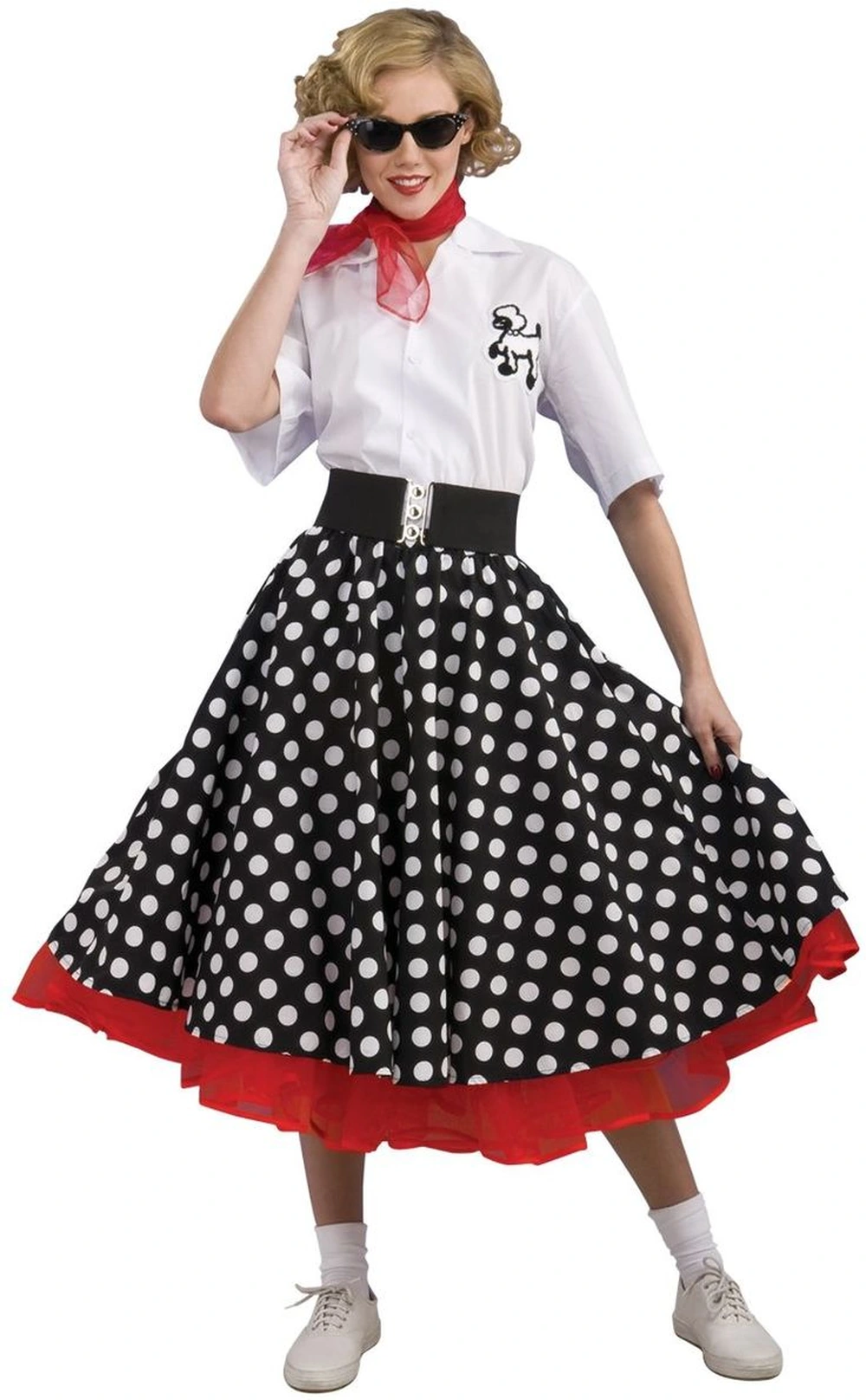Woman in 1960s mod style outfit with polka dot skirt