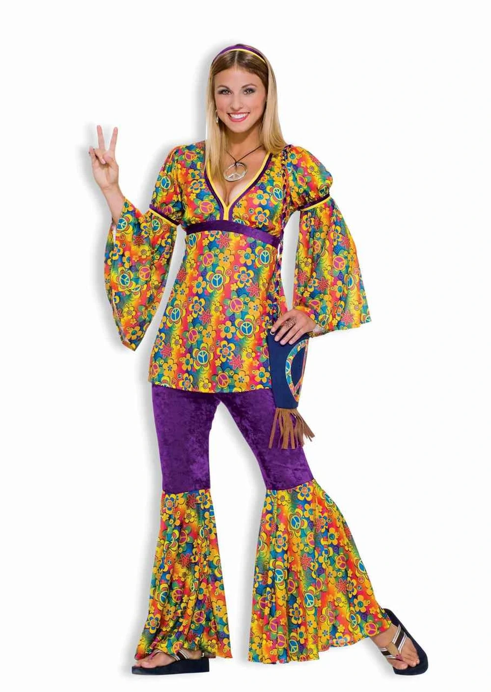 Woman in 60s hippie outfit with fringe vest