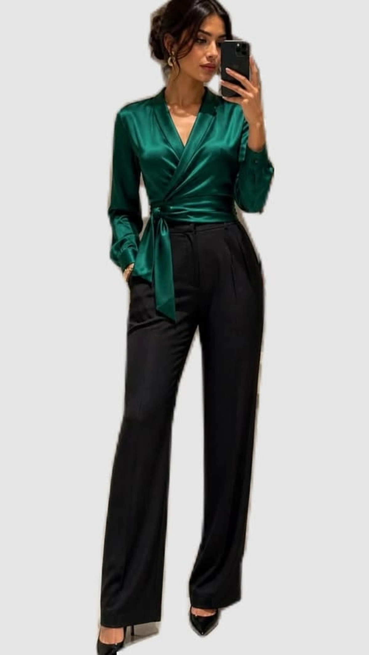 Emerald green satin wrap blouse with black wide leg trousers in a mirror selfie