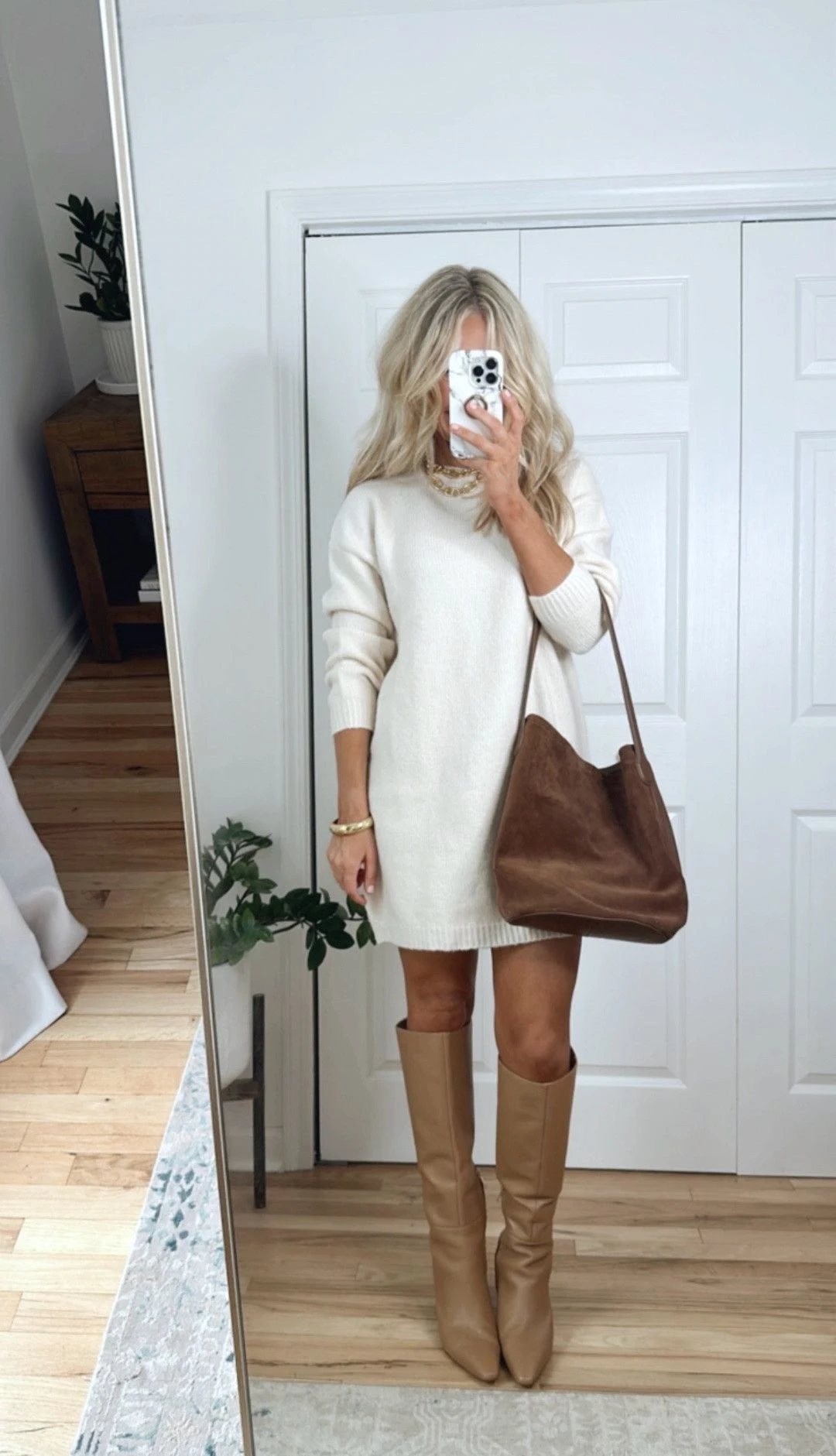 Cream sweater dress with tan knee boots