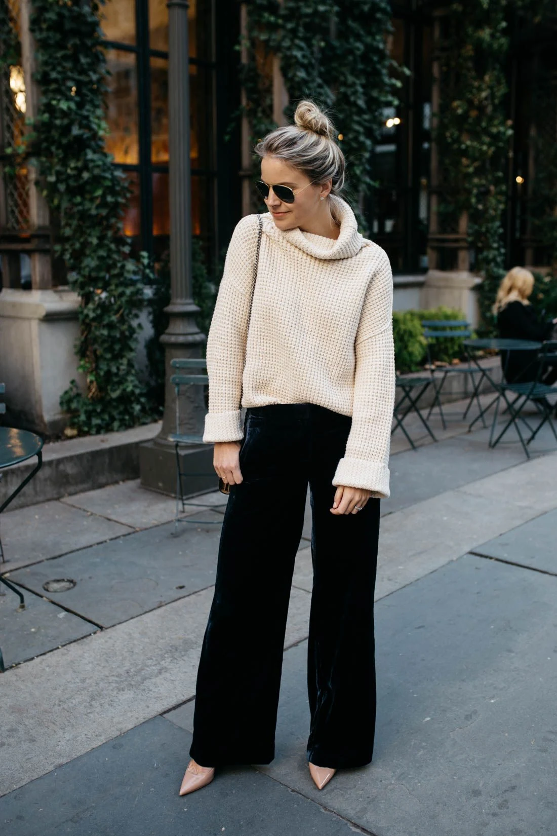 Cream knit sweater with black wide leg pants