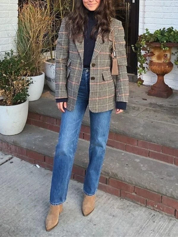 Thanksgiving outfit with plaid coat, light straight jeans, and brown pointed boots