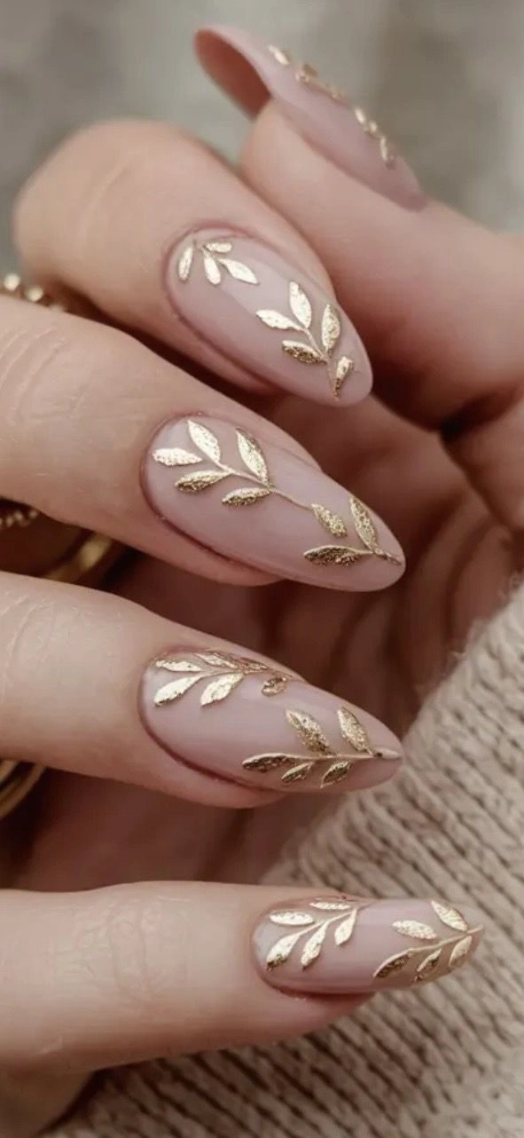 Nude nails with delicate gold leaf branches