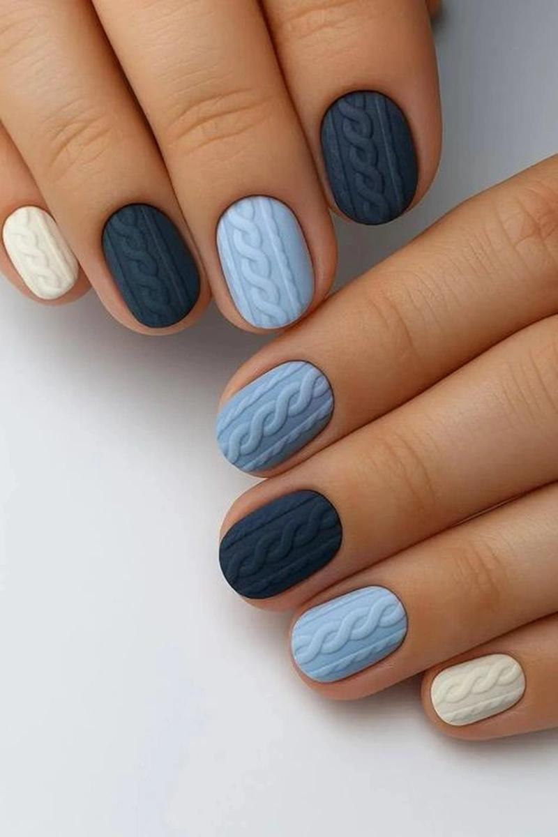 Navy blue sweater nails with knit texture