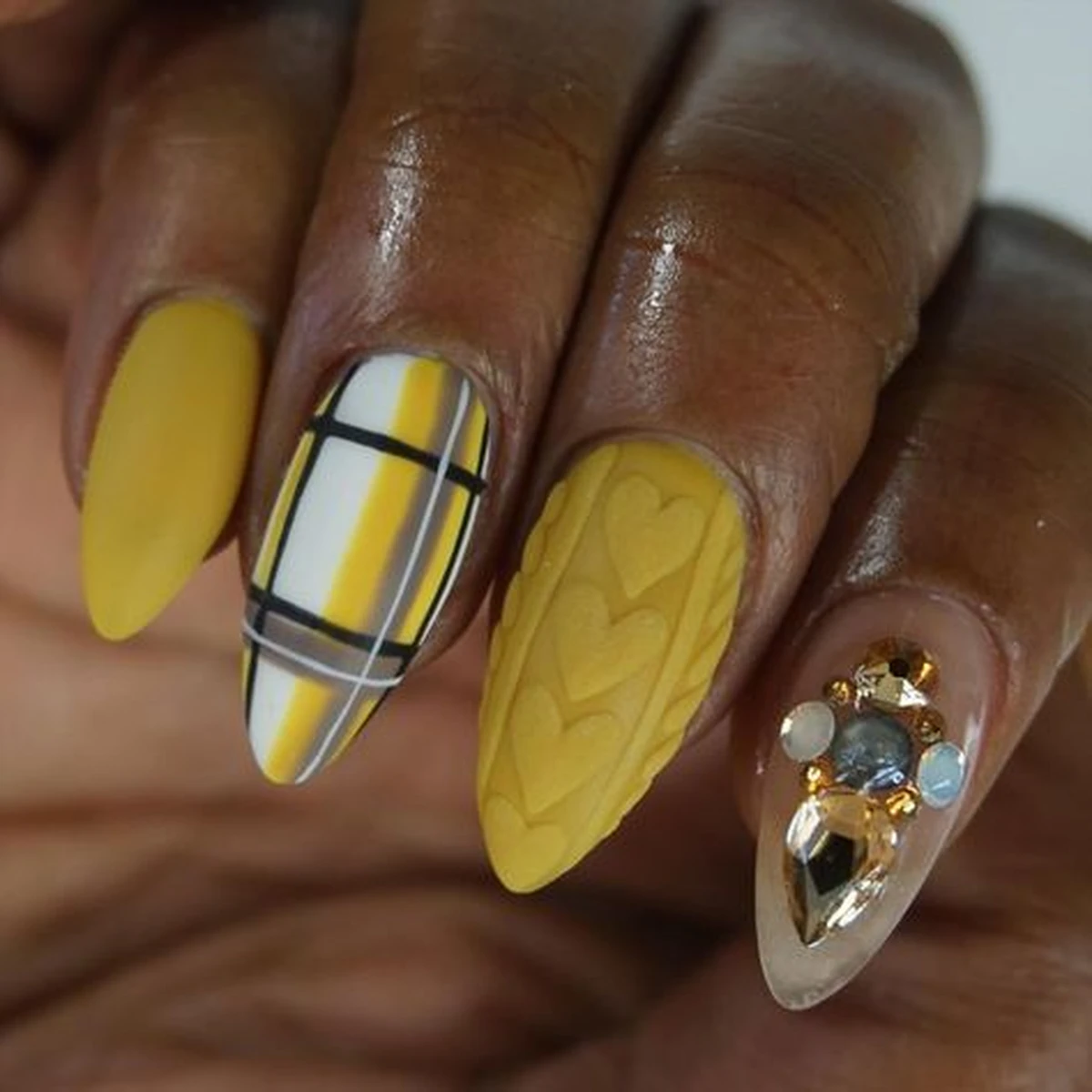 Sweater nails with rhinestone accent and knit texture
