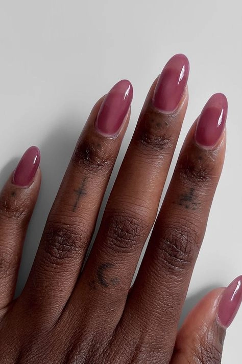 Burgundy fall nail polish on pale skin