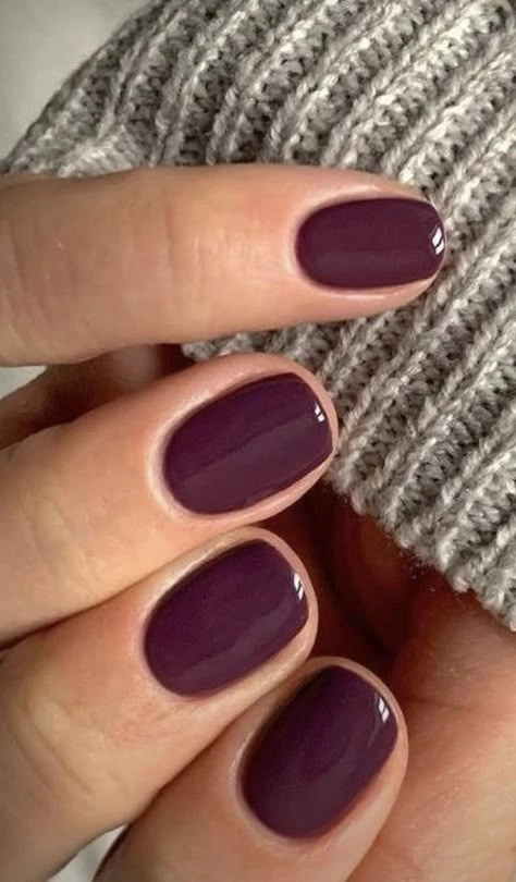 Deep plum nail polish for fall on fair skin