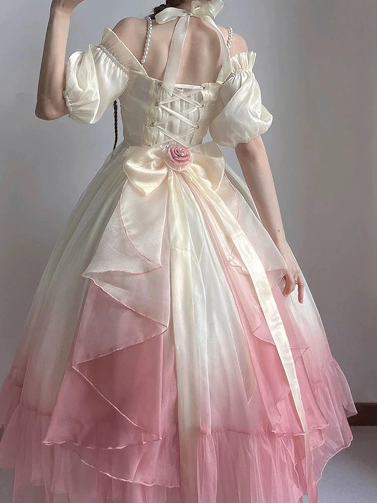 Lizzy McAlpine concert outfit: white and pink layered gown, back view