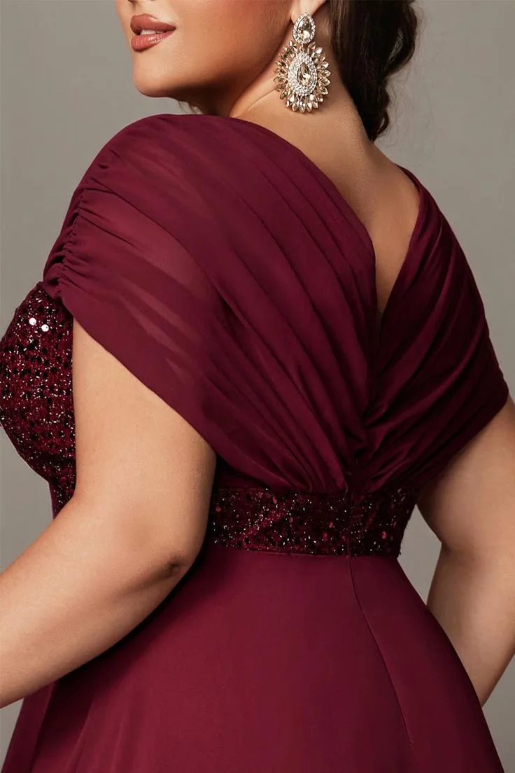 Draped burgundy gown neckline detail