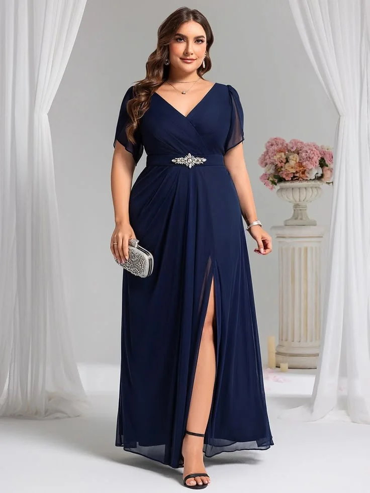 Navy formal gown with thigh slit on a plus-size woman