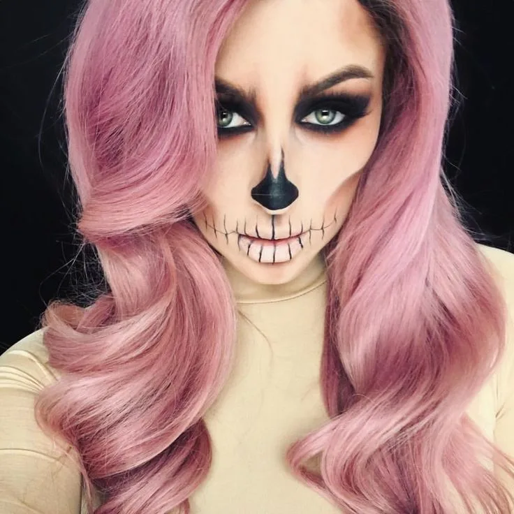 Pink hair halloween costume: pink skull face paint
