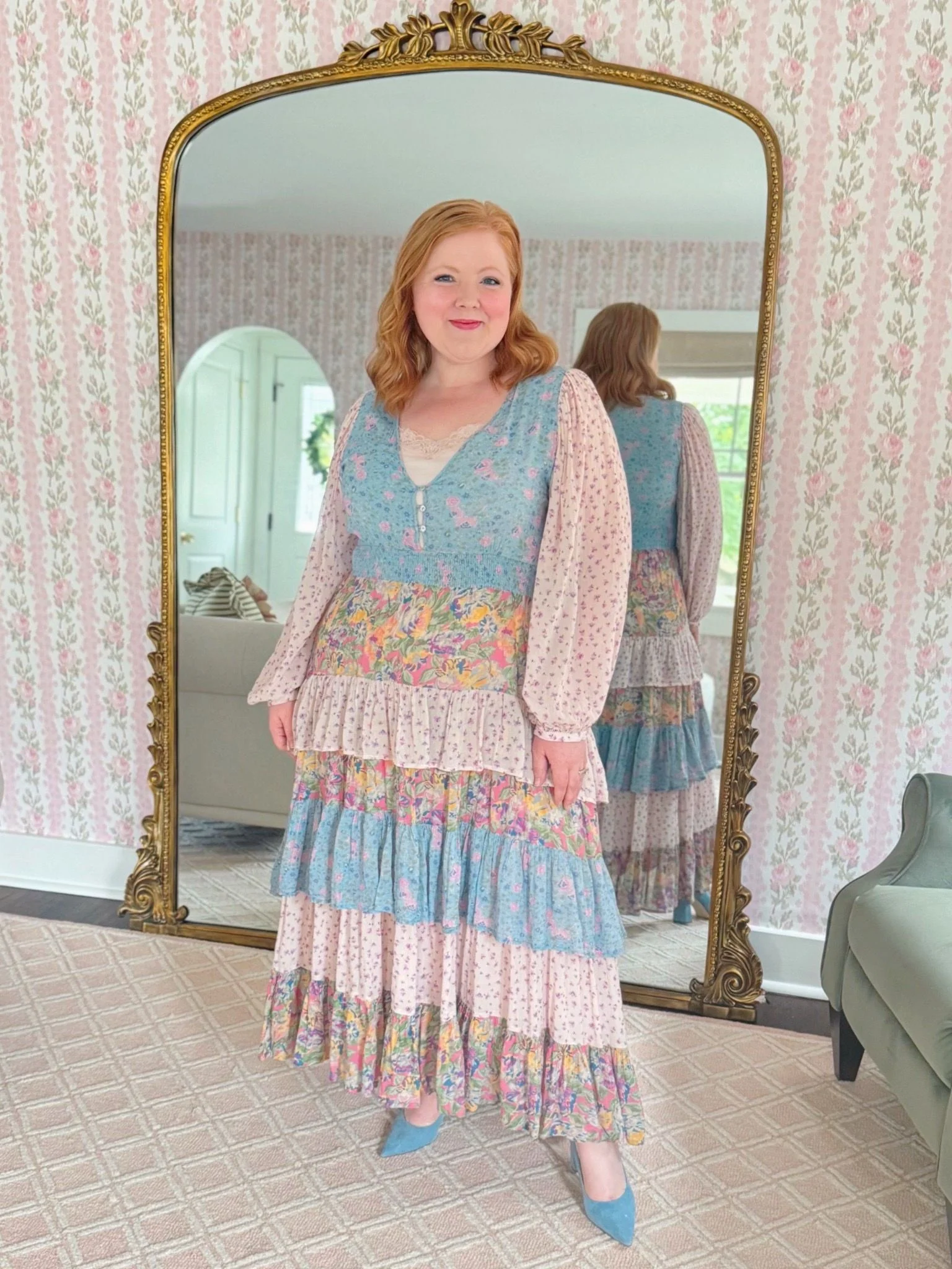Tiered floral prairie maxi dress reflected in a vintage gold mirror