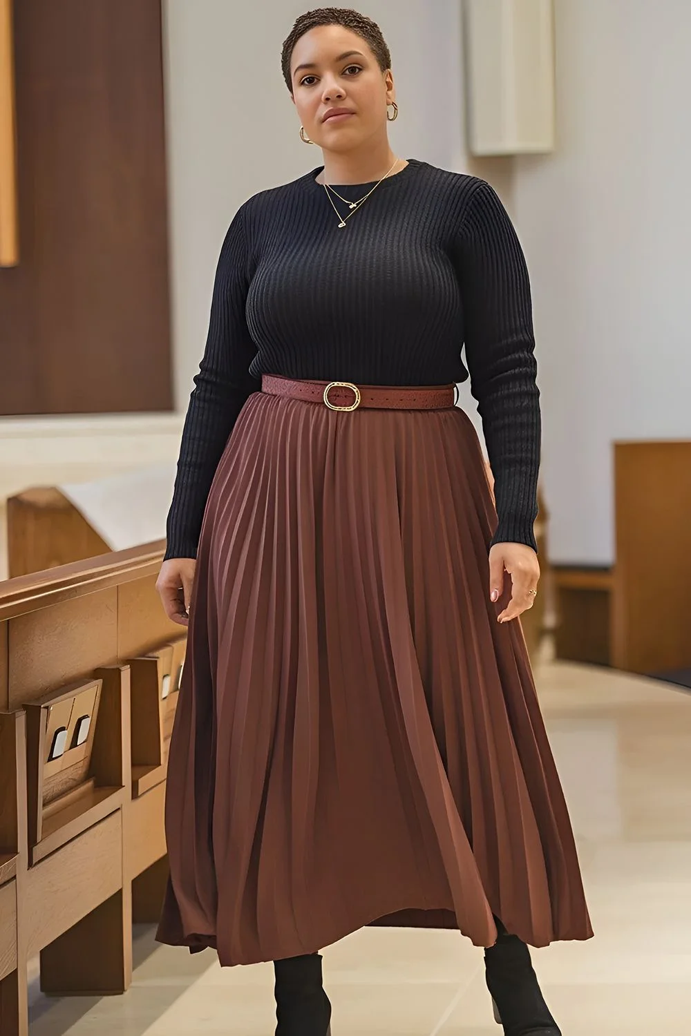 Plus size fall church outfit: navy ribbed sweater with rust pleated skirt