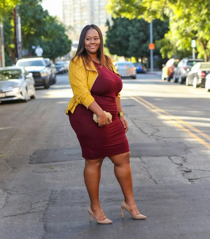 Mustard yellow top with burgundy bodycon dress, plus size Black woman