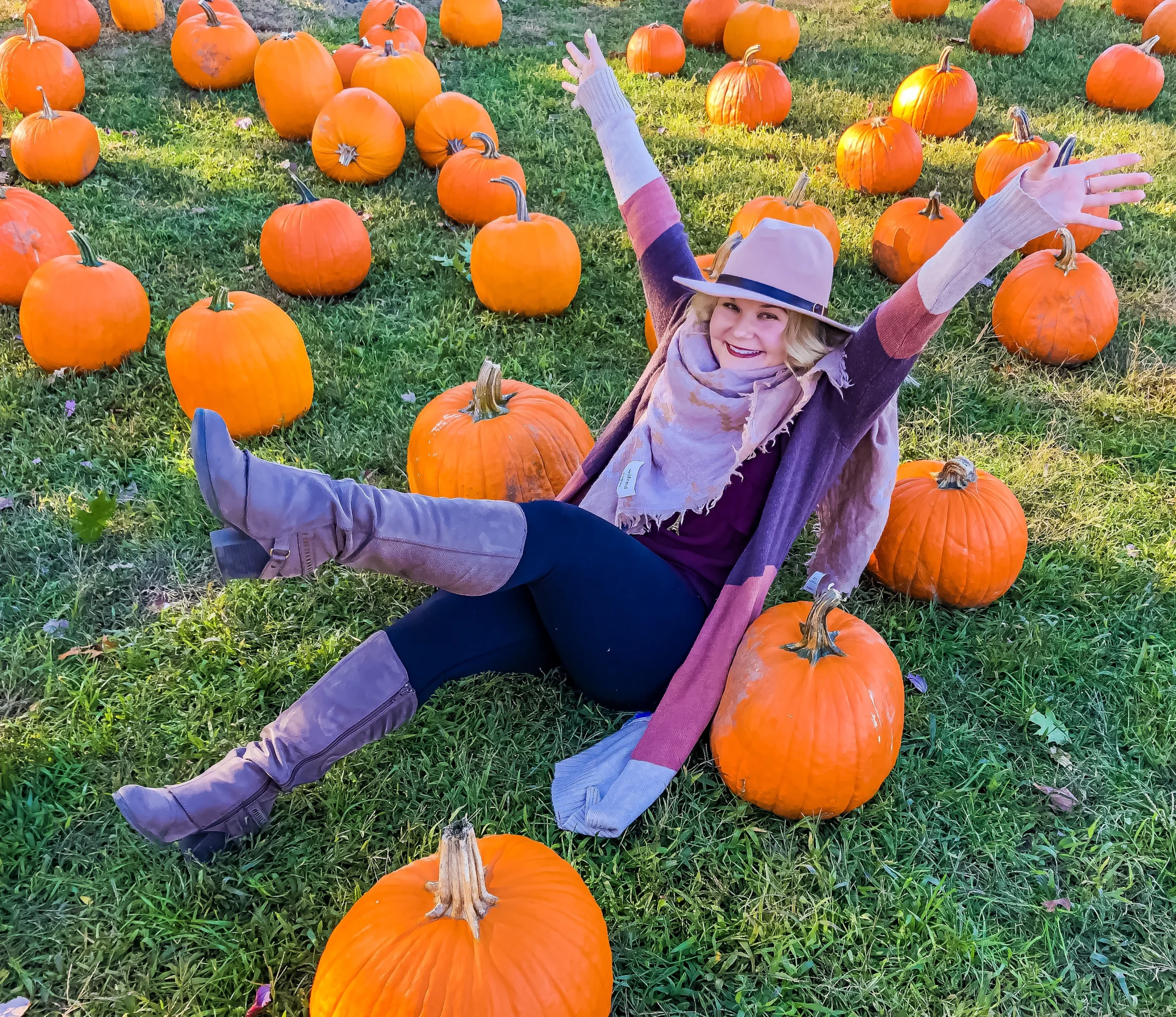 Plus size pumpkin patch outfit: colorblock cardigan with hat and tall boots