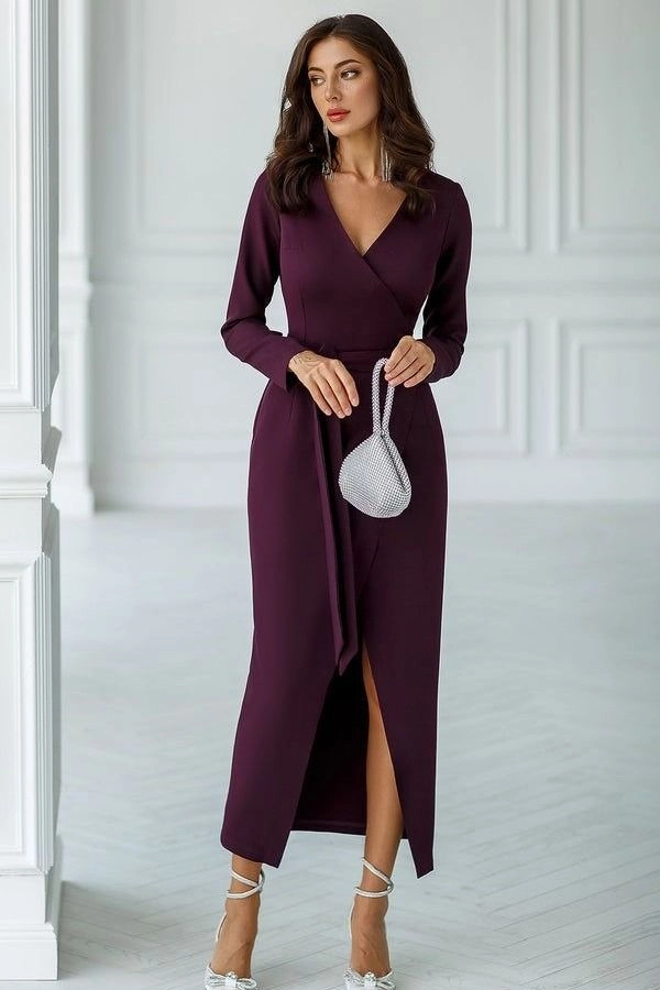 Petite woman wearing plum wrap dress with a defined waist for Thanksgiving