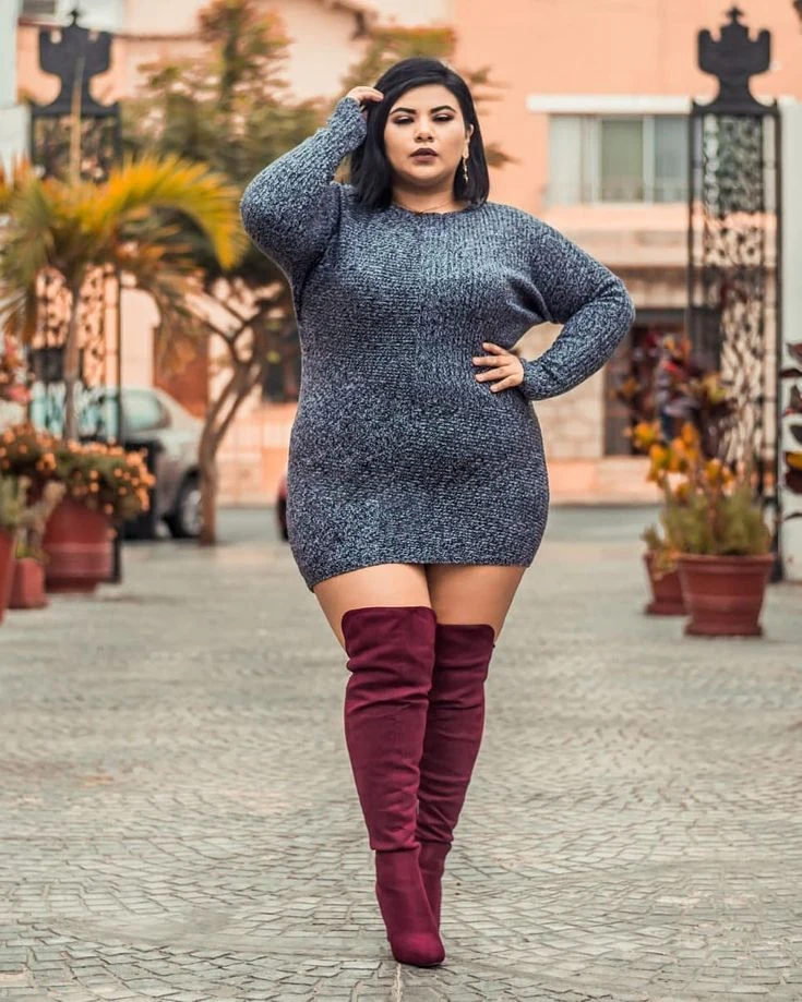Purple sweater dress with red over the knee boots