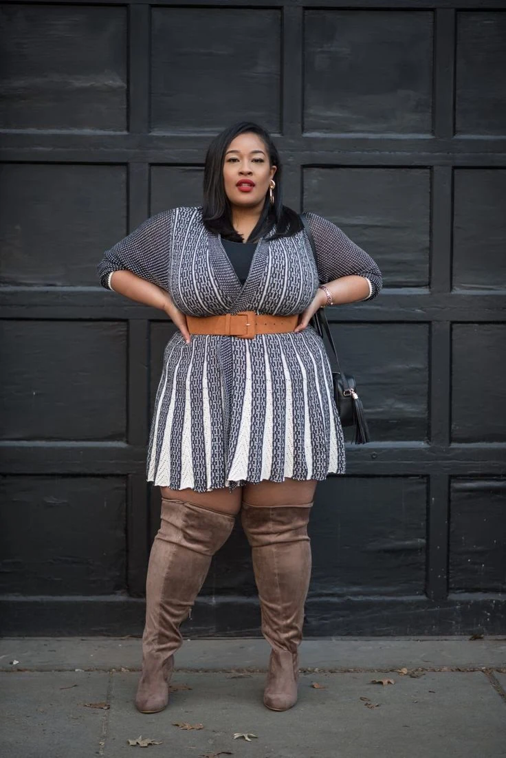 Striped sweater dress with tan boots winter look