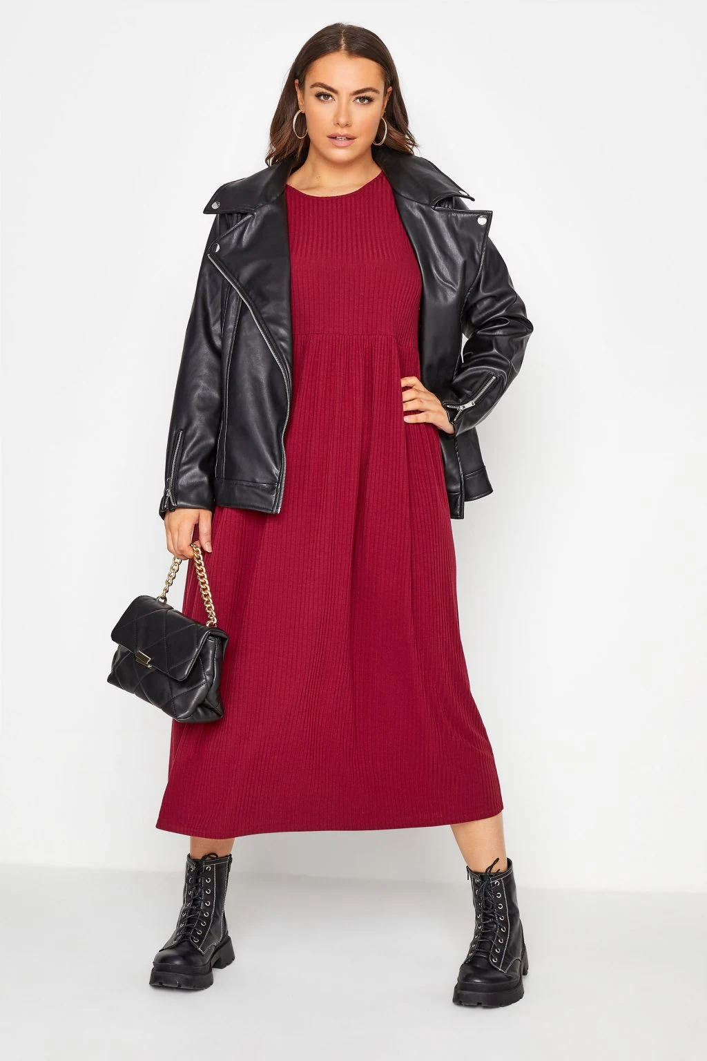 Red midi dress with black leather jacket winter look
