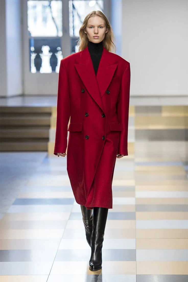 Veterans day blazer outfit: red double breasted long blazer with black boots