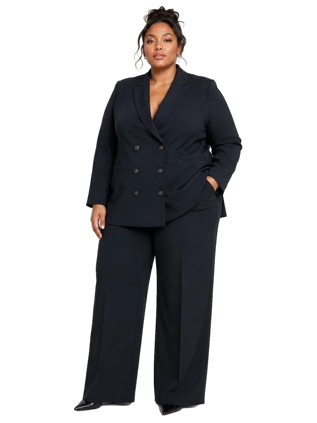 Veterans Day business casual outfit: burgundy blazer with grey wide-leg trousers on curvy woman